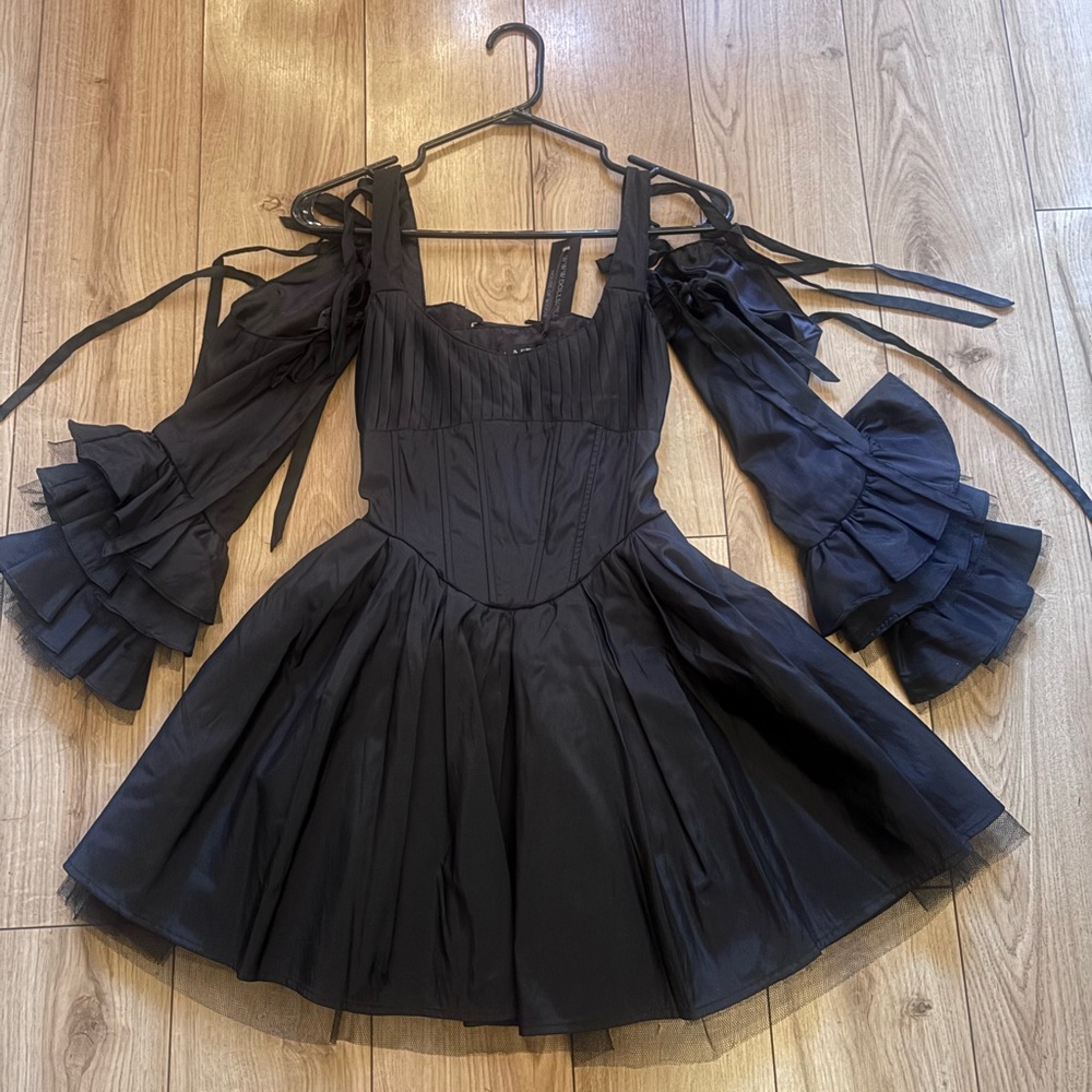 Widow dress with detachable bell sleeve arms.